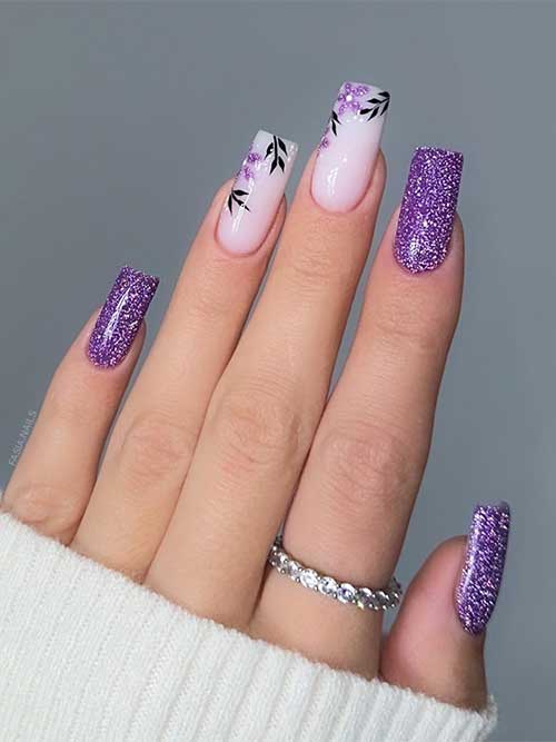 Long square-shaped purple fall nails with two milky white accents featuring black leaf art and glittery purple flowers.