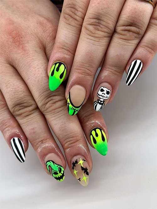 Medium almond-shaped Oogie Boogie Man Nails featuring black drip art and a white accent nail adorned with black stripes.