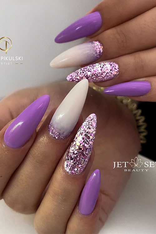 Long almond-shaped purple cute summer nails with white milky and glitter accent nails