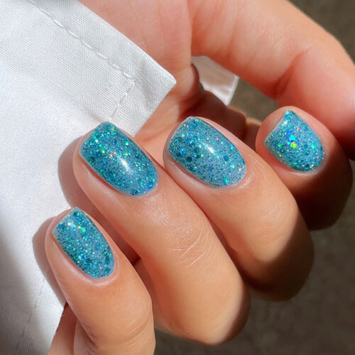 Short tropical blue cute summer nails with glitter