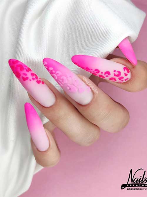 Long almond-shaped matte pink summer ombre nails with pastel and bold pink leopard prints on three accent nails