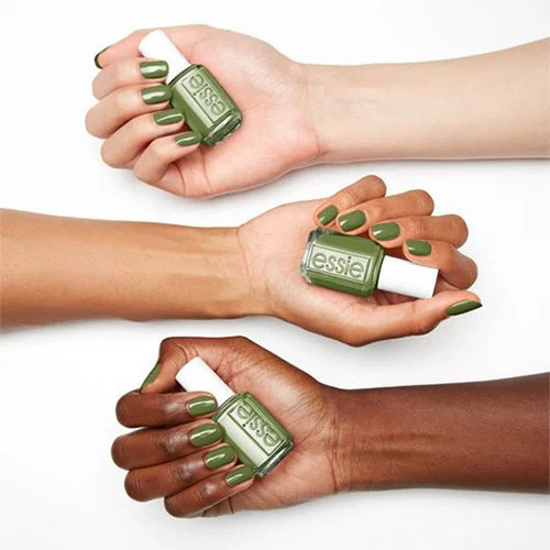 Creamy olive green nails painted with Essie Patch It Up from the Fall 2024 Punk at Heart Collection.