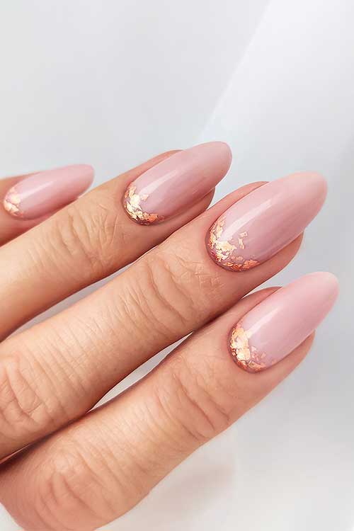 Cute shredded foil reversed French nails over nude pink nails