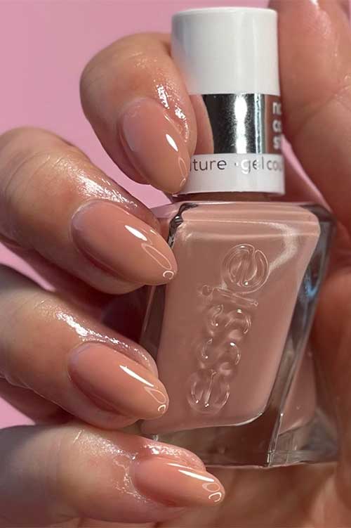 Cute sheer beige nude nails using Essie Gel Couture of corset nail polish