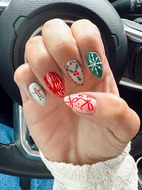 Festive red and green Christmas nails adorned with present, gingerbread, wreath, and snowflake designs.