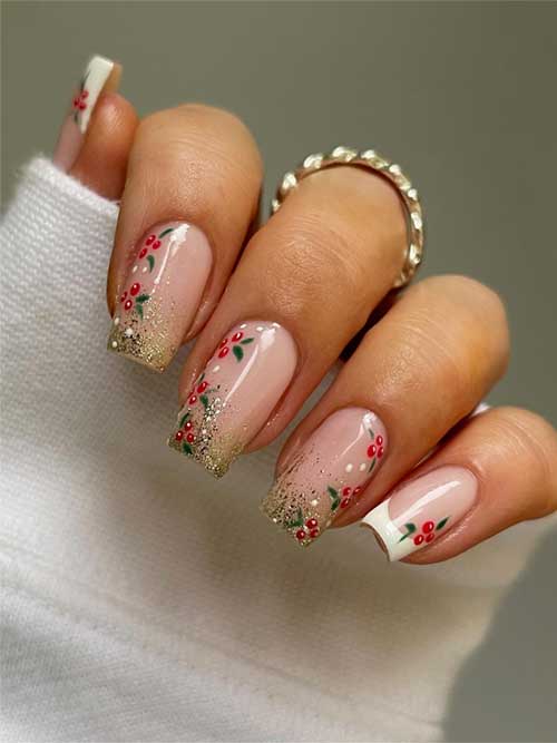 Simple Christmas nails with holly berry accented by white French tips and gold glitter are the best Christmas nail ideas