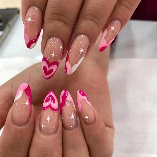 Medium pink heart French press-on nails in stiletto shape, 24 pieces of stylish acrylic nails for women and girls.