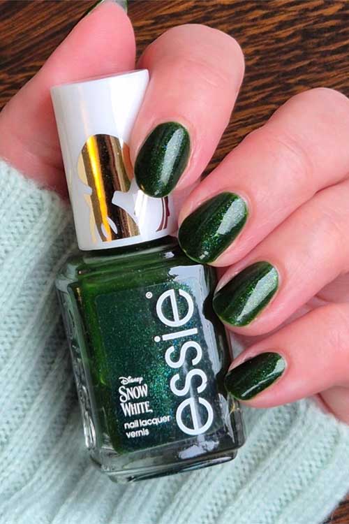 Deep emerald green nail polish from Essie x Disney's Snow White Collection, named "Seize the Crown."