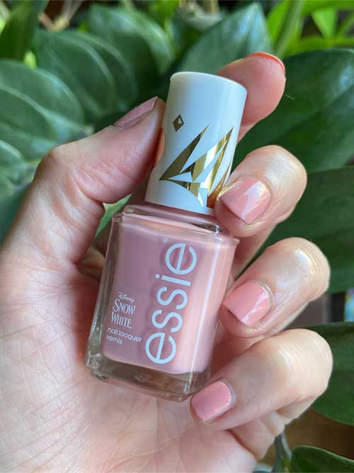 Dusty pink nail polish named "No Prince Needed" from the essie x Disney's Snow White Collection.