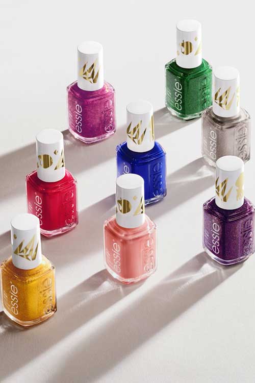 Essie nail polish collection inspired by Disney's Snow White, featuring vibrant colors and whimsical designs