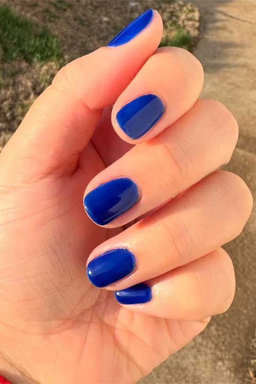 Mid-tone blue nail polish named "Brave and True" from Essie's Disney Snow White Collection.